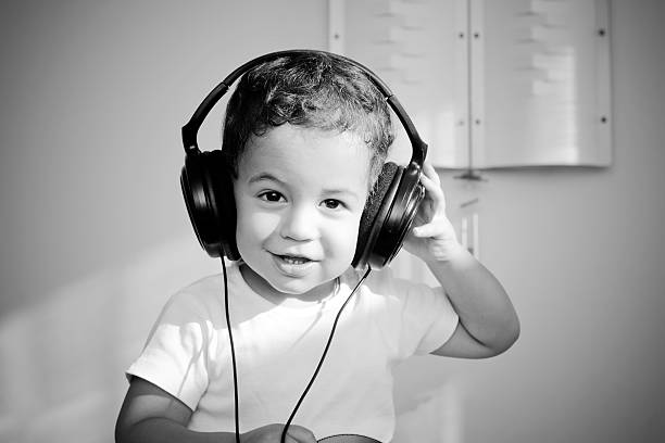 istock Boy in big headphones 146801625