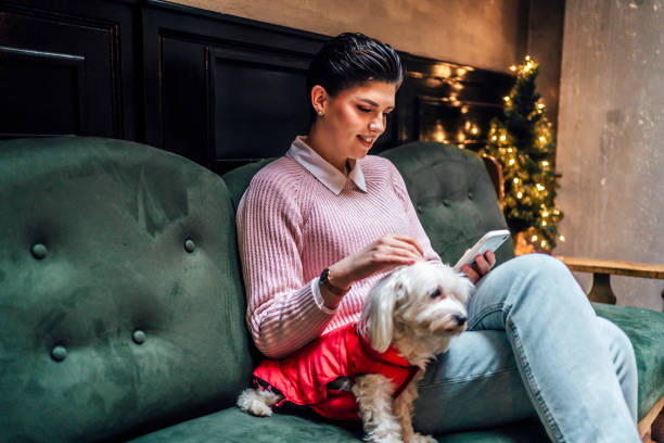 istock Woman with her cute Maltese dog 1468018978