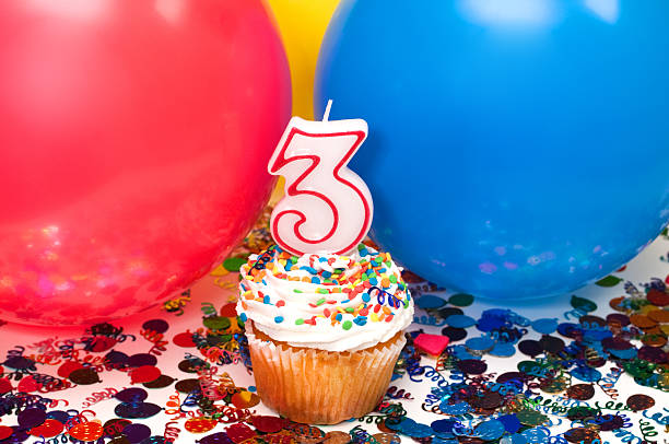istock Celebration with Balloons, Confetti, and Cupcake 146801921