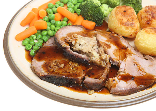 istock Roast Stuffed Loin of Pork Dinner 146802093