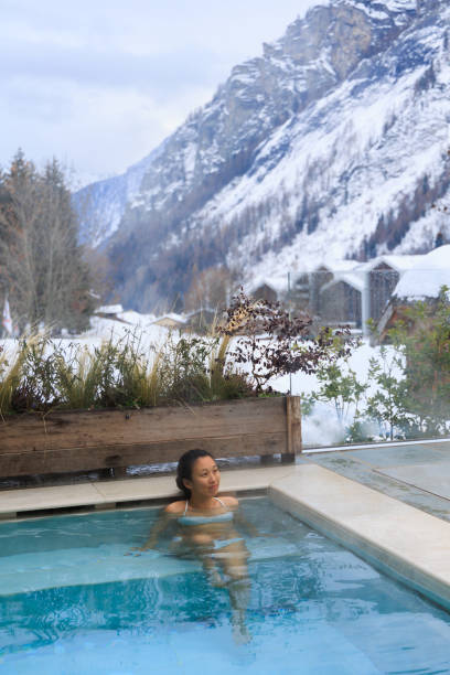 istock Lady inside hot water pool in the Italian Alps, Mont Blanc 1468021775