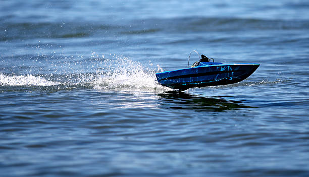 Toy Boat Rc boat in lake tahoe. remote controlled stock pictures, royalty-free photos & images