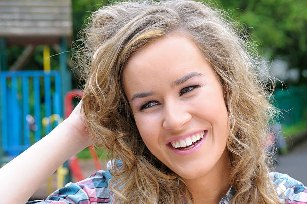 istock Pretty young woman smiling 146802395