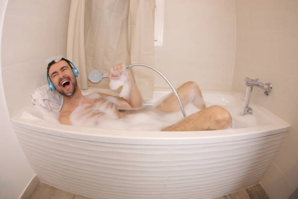 istock Man singing in the bathtub 1468033588