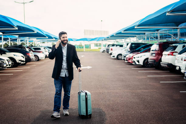 istock Man walking in airport parking lot 1468040714