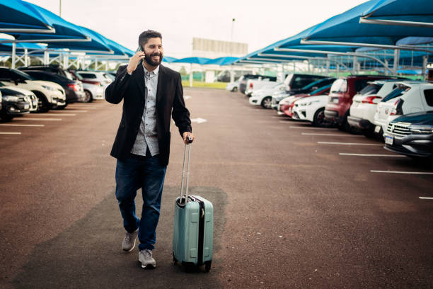 istock Man walking in airport parking lot 1468040715