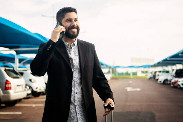 istock Man walking in airport parking lot 1468040734
