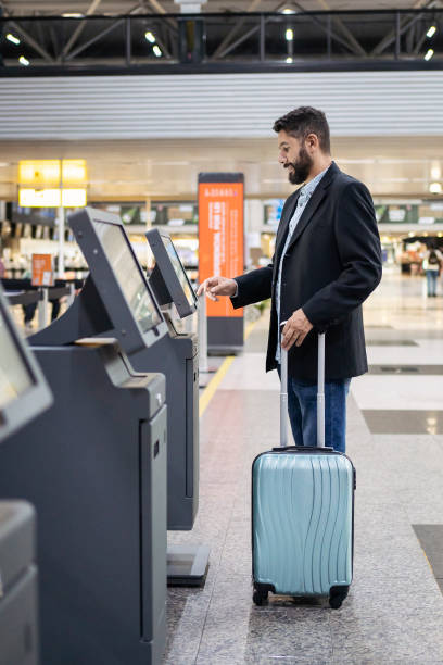 istock Man checking in at the airport 1468040783