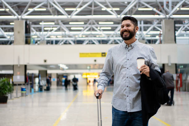 istock Businessman waiting for his flight at airport 1468040838