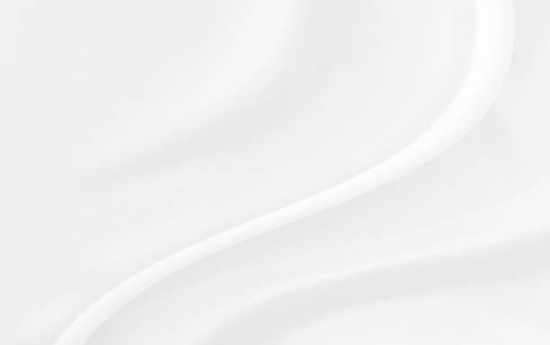 istock White gray satin texture that is white silver fabric silk background with beautiful soft blur pattern natural. 1468042297