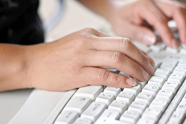 istock female hands typing away on a keyboard 146804964