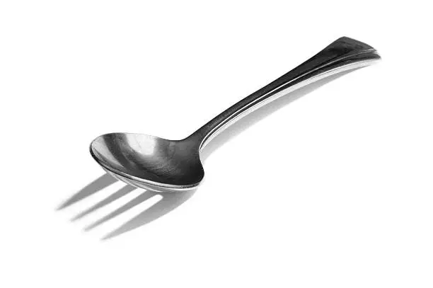 Spoon with fork shadow