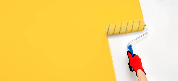 istock Close up of painter, roller painting 1468056135
