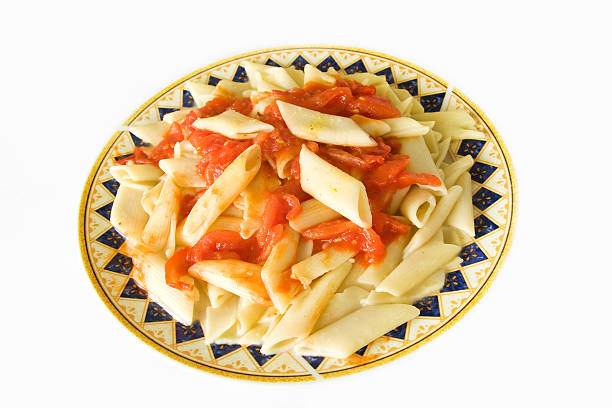 włoski makaron - penne rigatoni pasta tomato pasta zdjęcia i obrazy z banku zdjęć