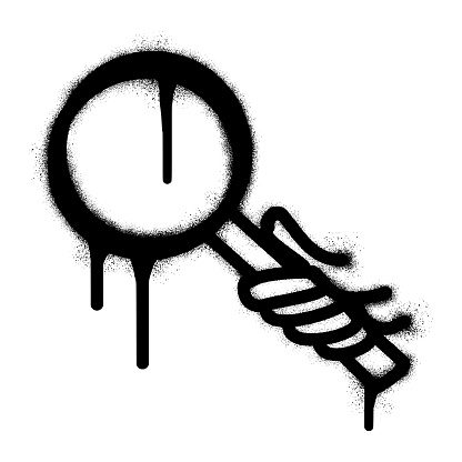 Hand graffiti holding magnifying glass with black spray paint