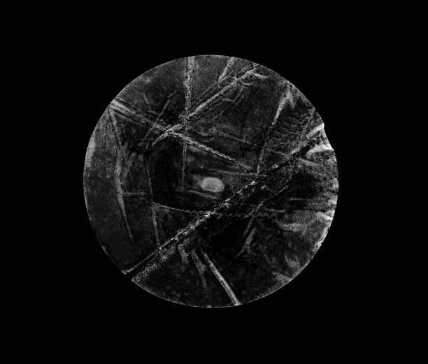 istock transparent adhesive round plastic sticker label isolated on black background 1468060175