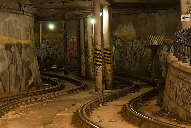 Tramline in the tunnel painted with graffiti