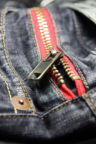 Closeup Red Jean Zipper on Denim stock photo