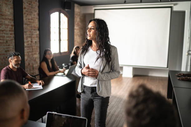 istock Transgender woman talking during a class or seminar 1468064089