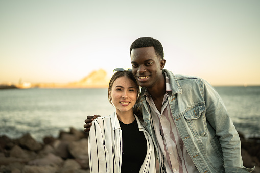 Portrait of young couple at the beach