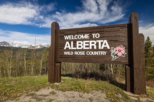 Welcome To Alberta Wild Rose Country Sign in Waterton Lakes National Park, Alberta, Canada