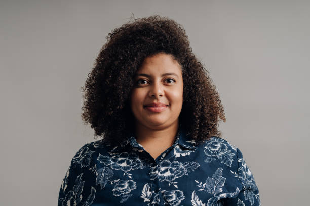 istock Curly hair woman in studio 1468069772