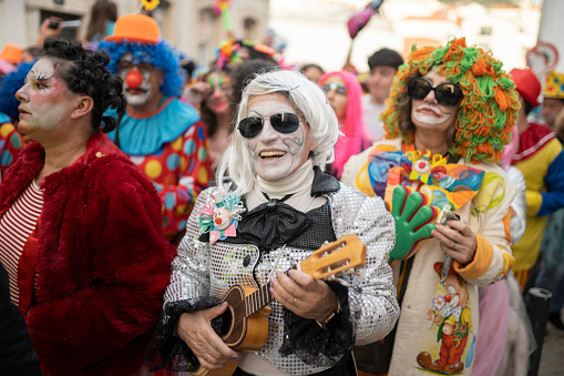 Sesimbra, Portugal - February 20, 2023: Clowns parade at Carnival in Sesimbra.