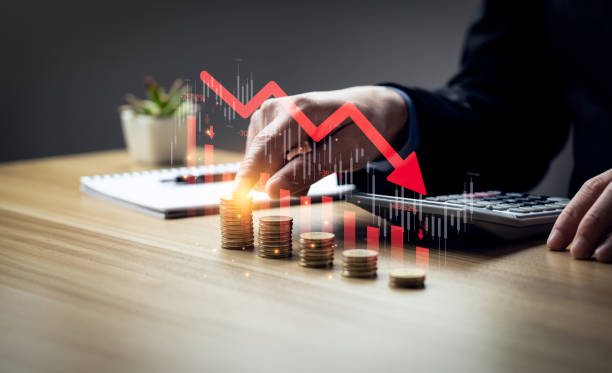 istock Economic collapse concept, businessman with falling financial graph chart due to global recession. Stock market crash, inflation, financial crisis, Falling income in GDP, capital reduction 1468083174