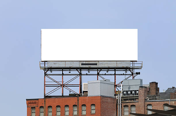 großes plakat in der stadt - clear sky urban scene boston massachusetts stock-fotos und bilder