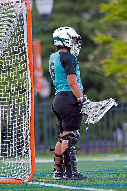 istock Girls Lacrosse goalie stands ready 146808540