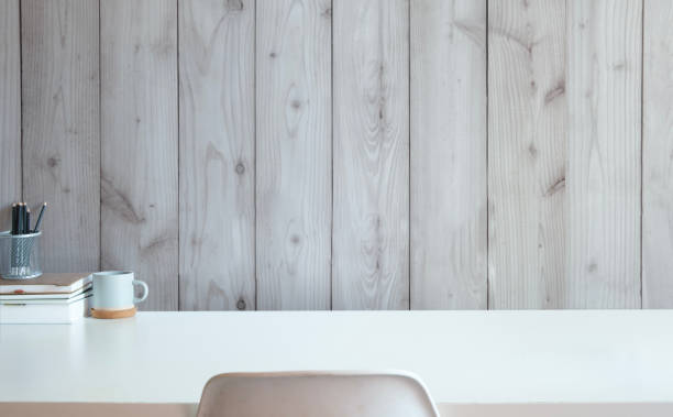istock Minimal and simple workplace, Cup of coffee, books and pencil holder on white table. Copy space for text. 1468089769