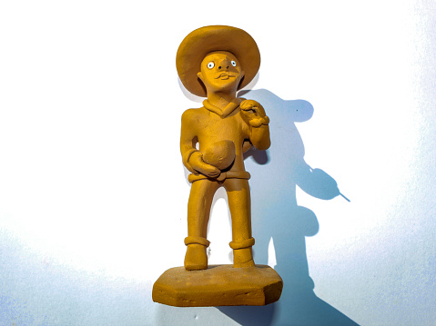 A souvenir sold to tourists at the market in Fortaleza, Ceará, Brazil, is the clay doll that portrays the Northeastern man.