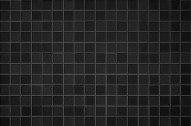 istock Black tile wall high resolution real photo or brick seamless pattern and texture interior room background. Dark grid tiles wall texture for the decoration of the bedroom, Home or office backdrop. 1468093099