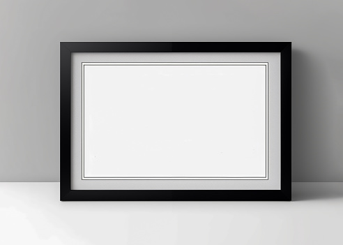 Horizontal diploma frame mockup. Empty black photo frame on shelf or table. Mock up black frame Certificate. Picture frame mockup