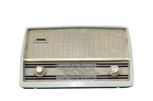 Vintage radio with display showing European cities isolated on a white background