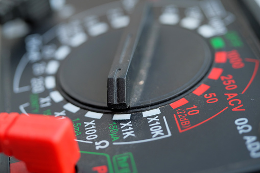 Analog electronic current meter or multimeter. Macro shot