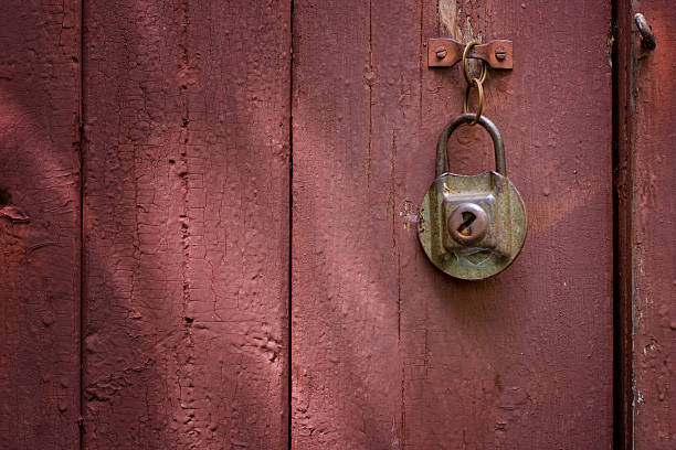 istock unlocked old wooden door 146810643