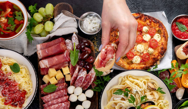 istock Italian food dishes on dark background. 1468108459