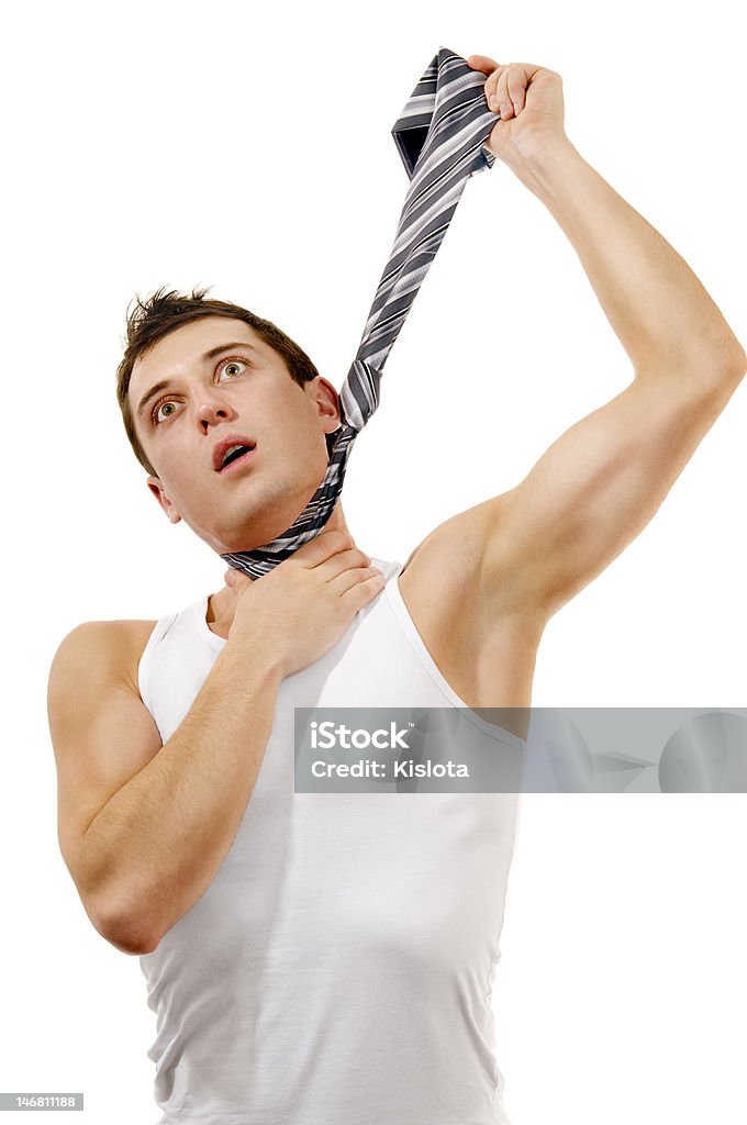 Muscular man hangs himself in a tie Abdomen Stock Photo