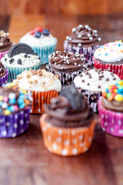 istock Colorful chocolate cupcakes with toppings 1468111910