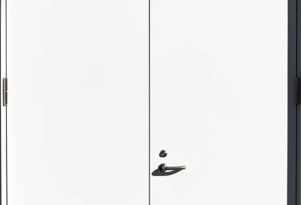 Close-up of closed white metal door.