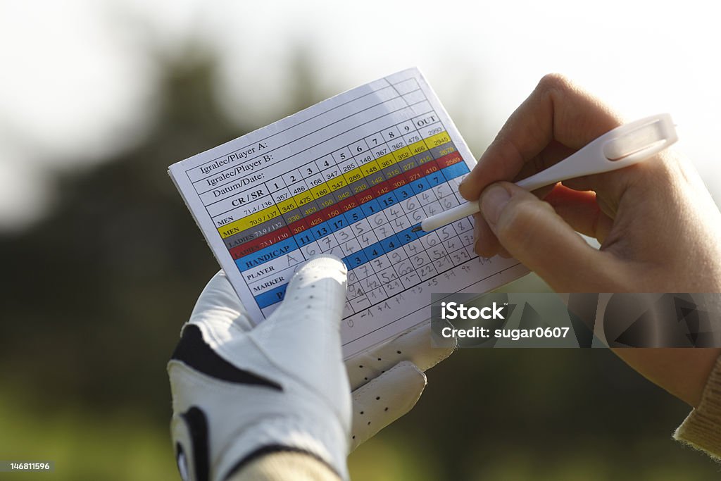 Writing golf handicap Writing golf handicap with a glove. Golf Stock Photo