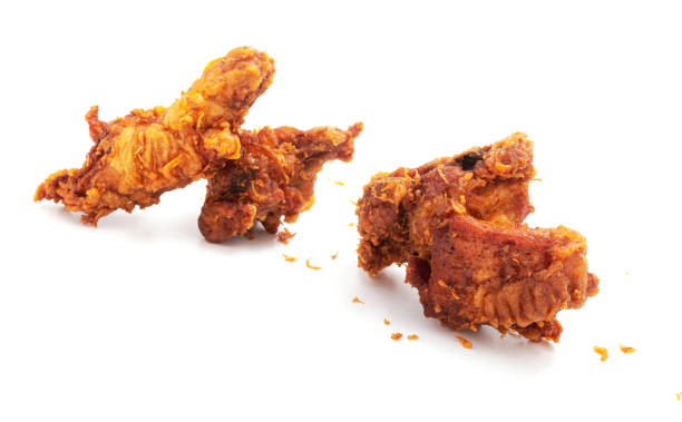 istock Pieces of fried chicken isolated on a white background 1468117043