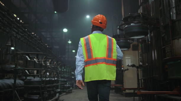 istock Unrecognizable man supervisor walking at digital production industrial storage. 1468117803