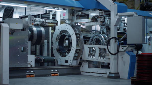 istock Huge industrial machine at digital production factory. Modern technology concept 1468121812