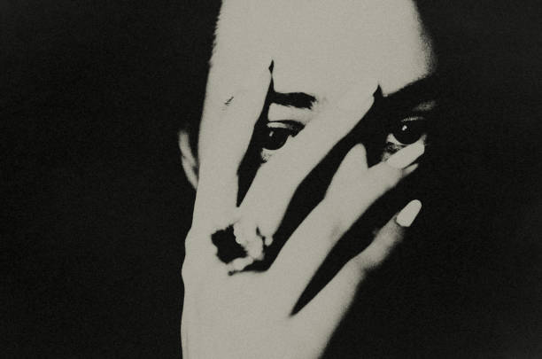 istock The young woman in the dark. 1468127032
