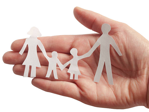 istock family in female hand 146812788