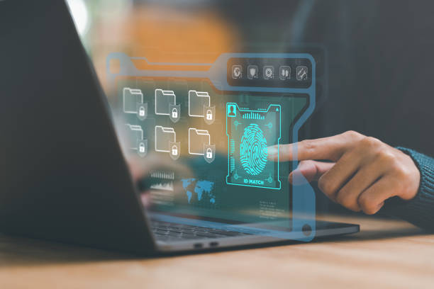 istock Accountants scan their fingers through the security system, to access documents online, cyber security ,Protecting data from theft ,digital security unlocking or encryption ,internet security 1468128724