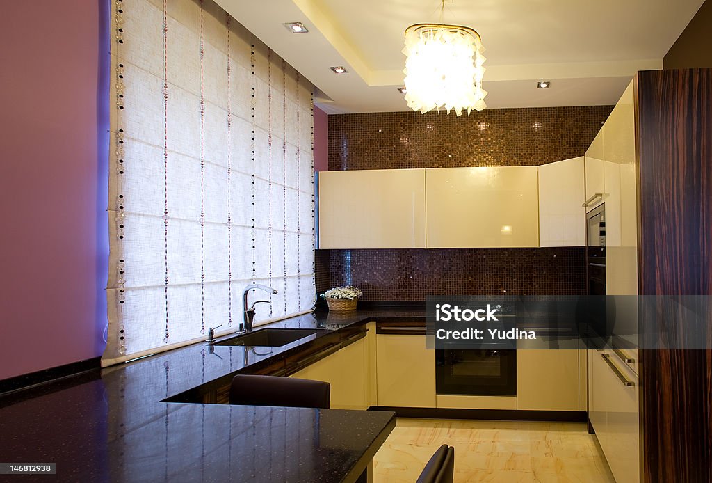 Domestic Kitchen Wide angle photo of a kitchen in a condominium.. Apartment Stock Photo