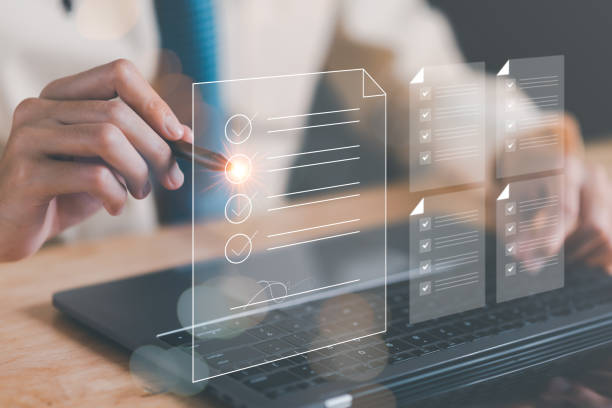 istock Businessman Audit online documents, quality assessment management With a checklist, business document evaluation process, market data report analysis and consulting, plan review process. 1468129768